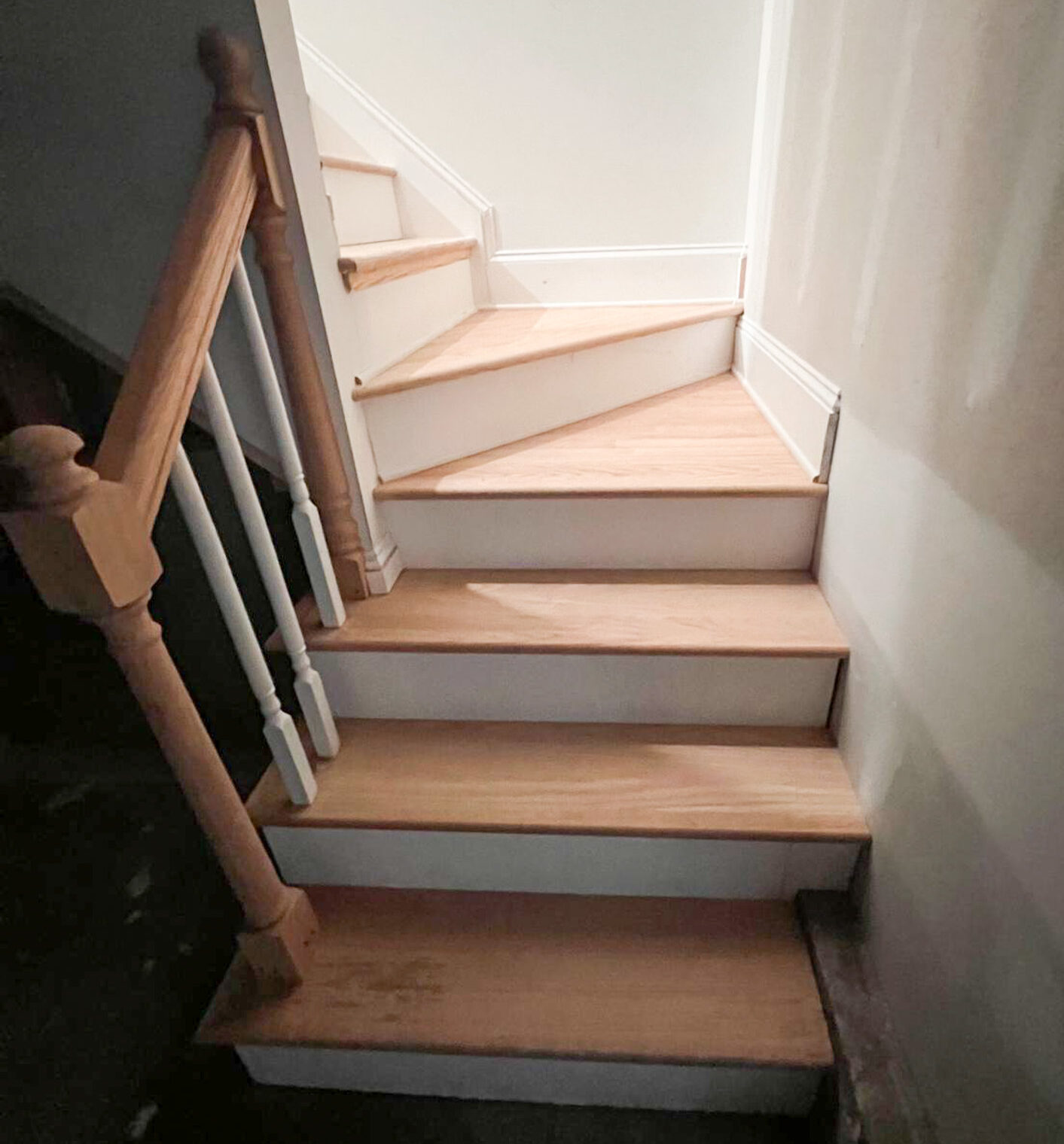 Stairs after flooring Morales Flooring installation raleigh nc Hardwood floor installation before and after - kitchen remodel by Morales Flooring Raleigh NC